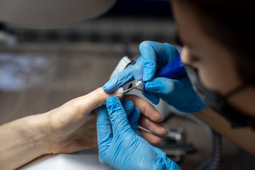 professional gamblet processing of nails by a manicurist