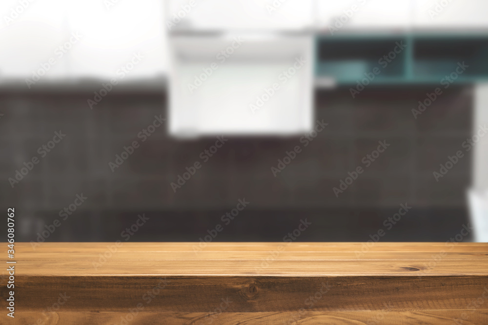 Wall mural wood desk space and blurred of kitchen background. for product display montage. business presentatio