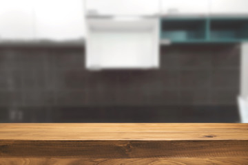 Wood desk space and blurred of kitchen background. for product display montage. business presentation.