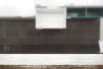 Wood desk space and blurred of kitchen background. for product display montage. business presentation.