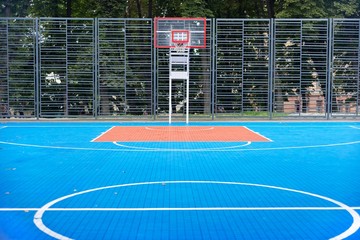 Outdoor urban basketball court blue, nobody, copy space, background