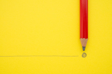 Black pencil write the end point on yellow paper background with copy space. Concept of conclusion,...