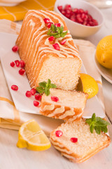Lemon sponge cake with pomegranate.
