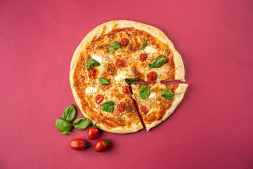 pizza close-up, isolated, against a colored background. whole pizza 