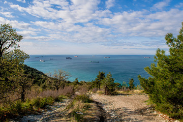 Fototapeta na wymiar Roadstead in Black Sea. Ship parking near the port. Panoramic view of the sea from above.