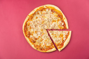 pizza close-up, isolated, against a colored background. whole pizza 