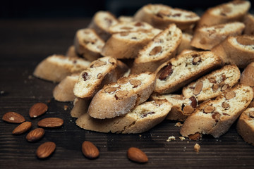 Homemade Italian cookies cantuccini and almond seeds on the table