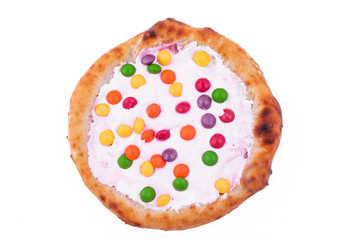 Sweet pizza with marshmallow sauce and colored sweets on a white background