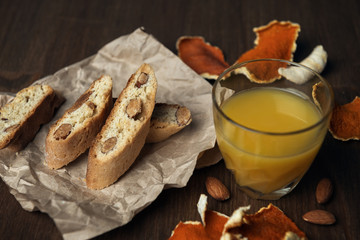 Homemade Italian cookies cantuccini and almond seeds with orange juice
