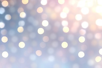 Shiny bokeh on blur blue pink lilac gradient background. Wonderful winter holiday template.