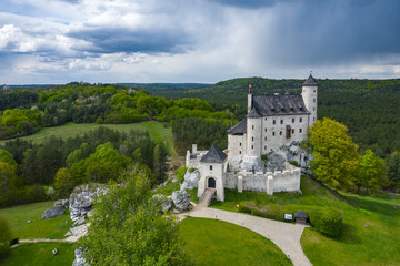 Fototapeta na wymiar Aerial view of Castle Bobolice, one of the most beautiful fortresses on the Eagles Nests trail. Medieval fortress in the Jura region near Czestochowa. Poland.