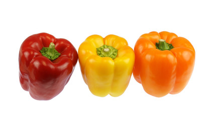 close up on fresh colorful peppers isolated on white background