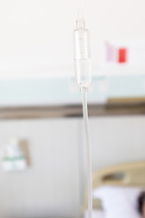 Close up saline solution drip for patient and infusion pump in hospital