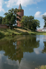 Fototapeta na wymiar castle tower with water around gåsetårnet in denmark