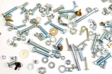 Bolts, nuts and screws. Pattern of nuts and bolts. There is a place for your inscription. Mock up.
