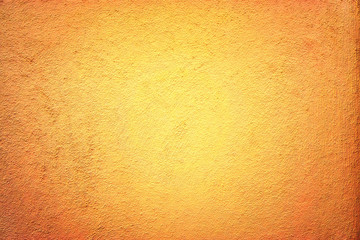 Terracotta colored abstract background with fine texture.