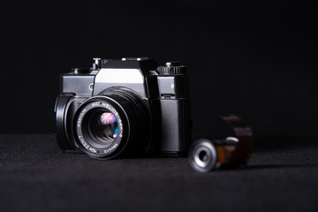 silver camera with film