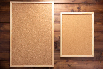 Fototapeta premium cork board on wooden background