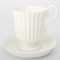 white porcelain Cup and saucer on a white background for tea table setting
