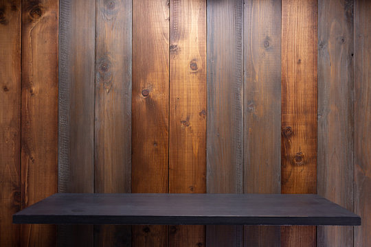 wooden shelf at board plank background wall