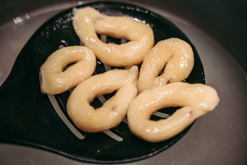 Hand-made taralli salty snack, typical from Puglia, Italy