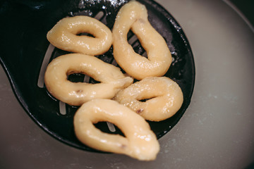 Hand-made taralli salty snack, typical from Puglia, Italy