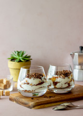 Italian dessert tiramisu in a glass. National cuisine. Traditional recipe.