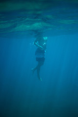 Fototapeta na wymiar Diving in clear water