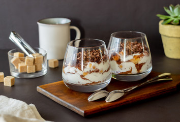 Italian dessert tiramisu in a glass. National cuisine. Traditional recipe.