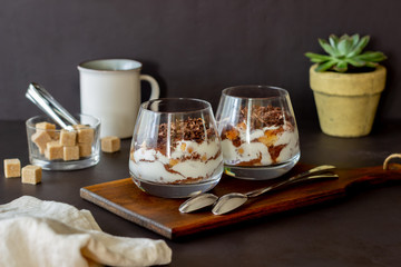 Italian dessert tiramisu in a glass. National cuisine. Traditional recipe.