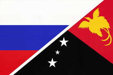 Russia vs Papua New Guinea, symbol of two national flags. Relationship between Asian and Oceanian countries.