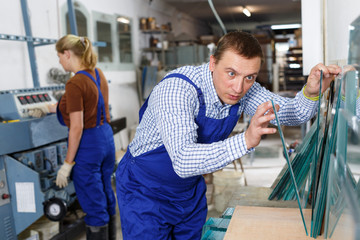 Man working in glass workshop