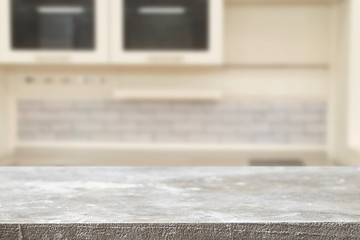 Wood desk space and blurred of kitchen background. for product display montage. business presentation.