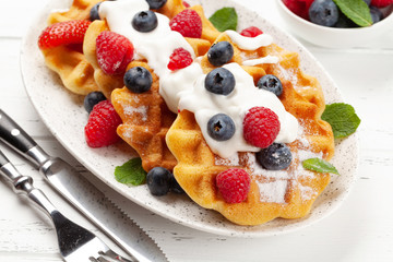 Delicious belgian waffles with summer berries