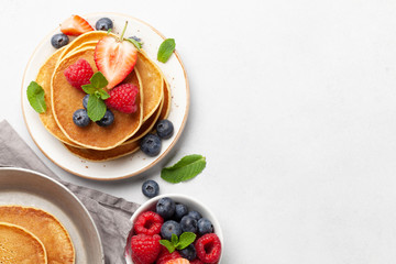 Delicious homemade pancakes with summer berries