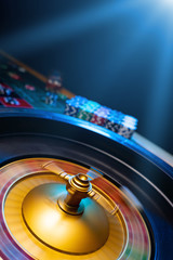 Spinning Roulette table close up at the Casino - Selective Focus