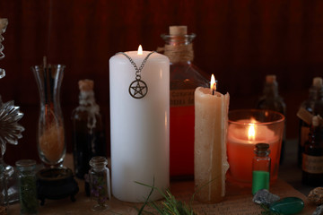 magic ritual with runes and pentagram and magical attributes