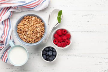 Healthy breakfast with granola and berries