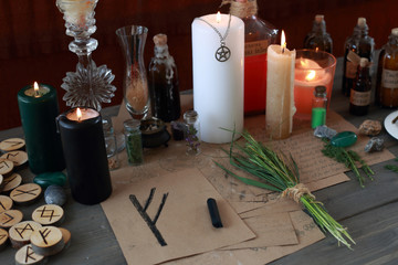 magic ritual with runes and pentagram and magical attributes