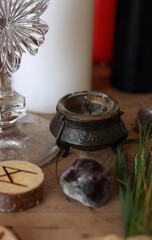 magic ritual with runes and pentagram and magical attributes
