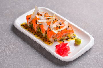 Fresh maki and nigiri sushi rolls with tuna fish and cheese. Asian Japanese cuisine concept.