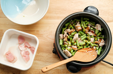 Thai food and meat pork on the wooden table with top shot.