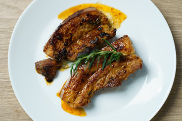 Pork juicy steak grill with vegetables and spices.
