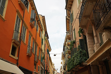 Fototapeta na wymiar Exterior architecture and design of Via Giuseppe Mazzini ,shopping street and UNESCO world heritage site city of Ferrara - Verona,Italy