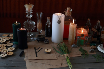 magic ritual with runes and pentagram and magical attributes