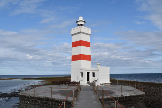 Gardur Old Lighthouse - Photograph of an old lighthouse on the Icelandic coast, just outside the city of Reykjavik