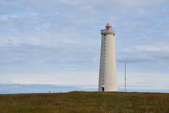 Gardur Folk Museum - photograph of an old lighthouse on the Icelandic coast, just outside the city of Reykjavik.