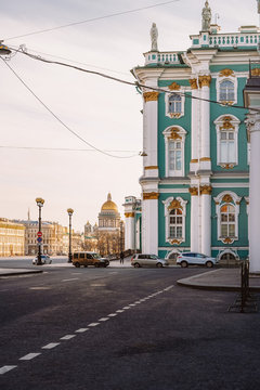 Beautiful building of the Hermitage Museum in St. Petersburg on Palace square, in the distance you can see St. Isaac's Cathedral