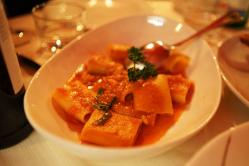 Close up Paccheri pasta in bolognese sauce