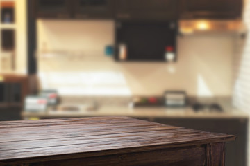 Wood desk space and blurred of kitchen background. for product display montage. business presentation.